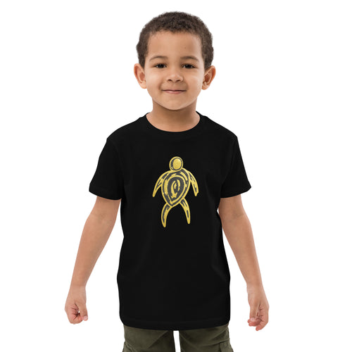 Midnight Spirit Tee — black organic cotton kids t-shirt with gold tribal sea turtle design, worn by a boy