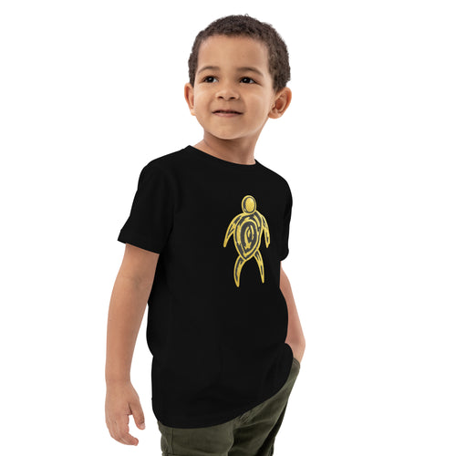 Midnight Spirit Tee — black organic cotton kids t-shirt with gold tribal sea turtle design, worn by a boy
